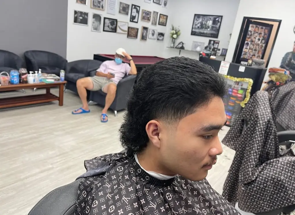 Modern mullet with a low taper fade at our West Perth barbershop
