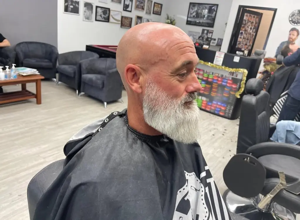 Customer with a trimmed and shaped grey beard at Royal Fade Barbers in West Perth