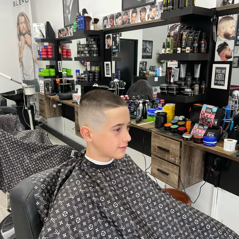 Young customer in the chair after a fresh fade at Royal Fade Barbers, West Perth